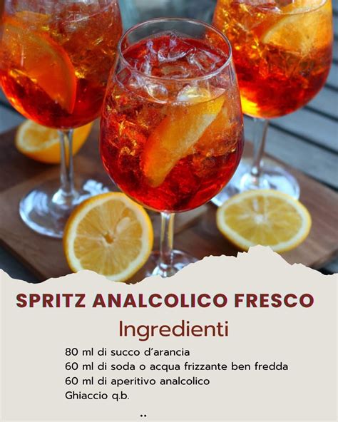 Calice di spritz analcolico con fetta d'arancia