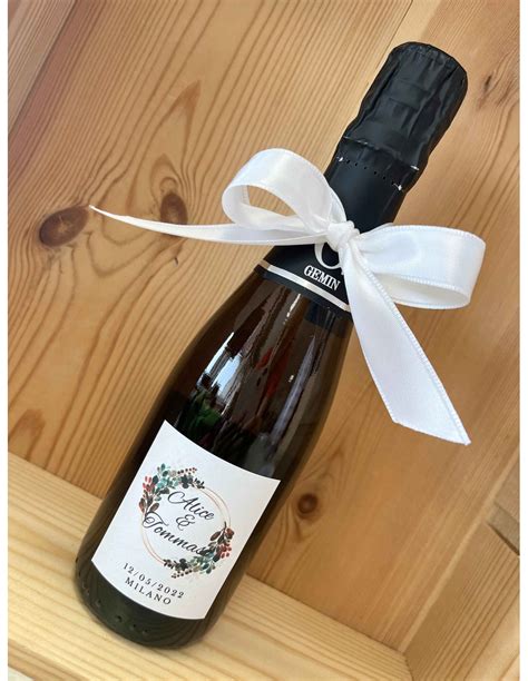 Bottiglia di Prosecco con legatura tradizionale e decorazioni
