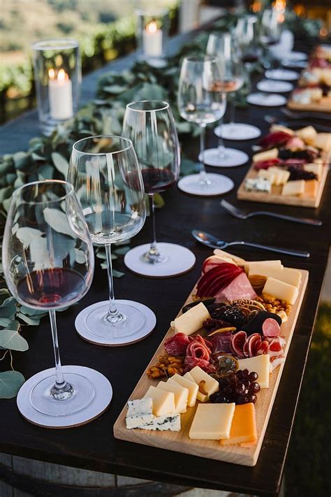 Wine tasting setup with cheese and charcuterie