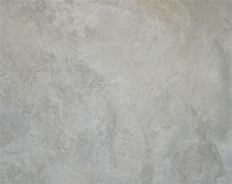 Dettaglio di pavimento in cemento decorativo con texture nuvolato