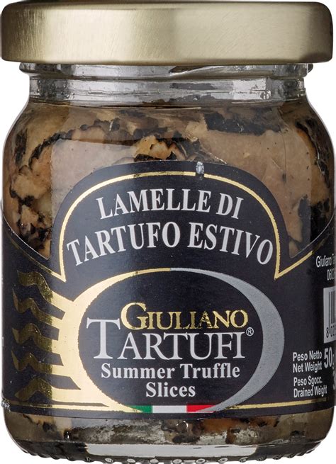 Tartufo bianco intero e lamelle di tartufo